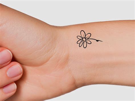 Daisy tattoo ideas for women photos