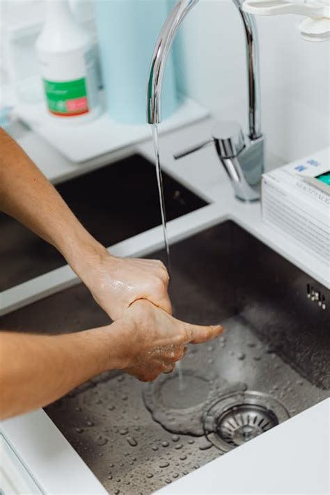 person cleaning  hands   stock photo