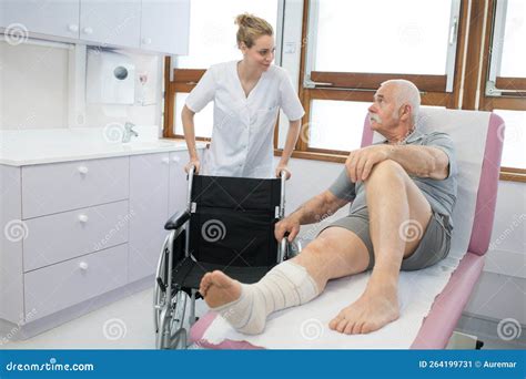 nurse helping recovering patient  wheelchair stock image image