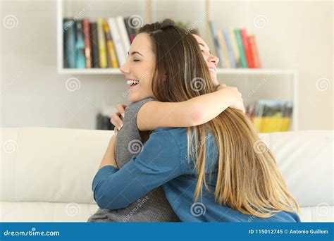 Two Happy Friends Hugging at Home Stock Image - Image of effusive ...