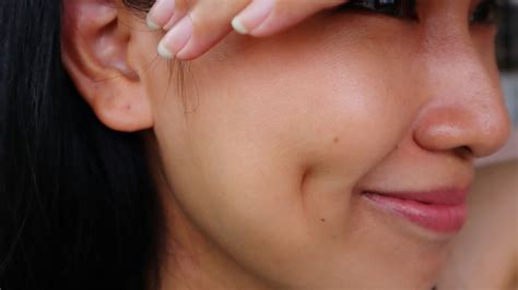 cheek piercing dimples