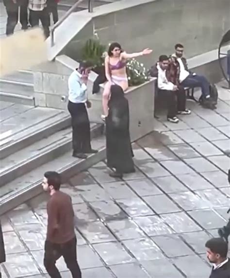 Iran detains woman who stripped to her underwear at university in