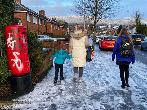Some school closures in West Belfast and icy conditions in north of the