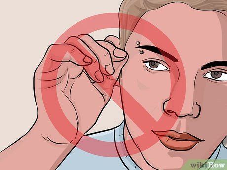 how to clean eyebrow piercing
