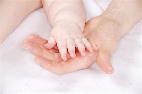 Mother and baby hands — Stock Photo © Pakhnyushchyy #50846131
