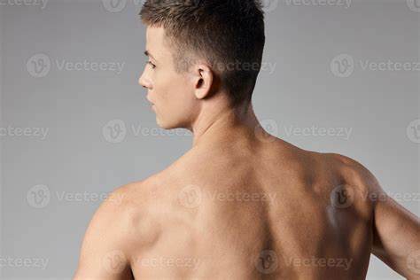 athletic men muscled arm muscles naked back gray background model