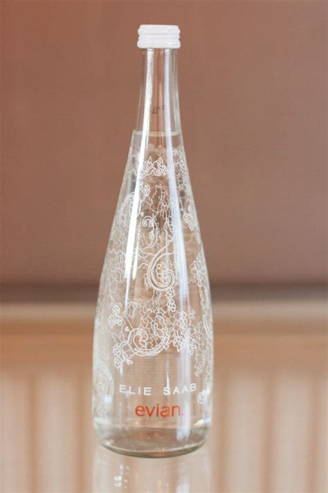 Win 3 Cases of this ELIE SAAB for Evian Water Bottle