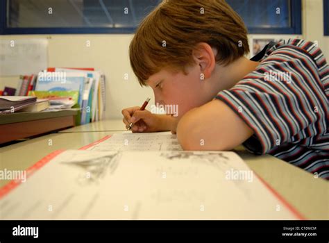 boy studying  classroom stock photo alamy