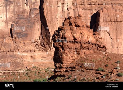 A close up view of a butte caused by weather erosion in the Courthouse Towers area of Arches ...