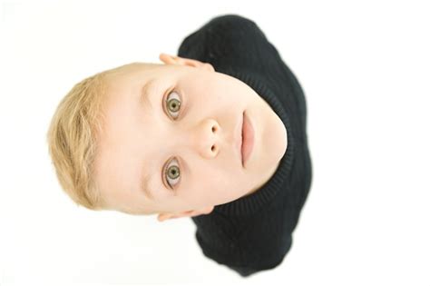 Premium Photo | The happy boy look to the camera. view from above