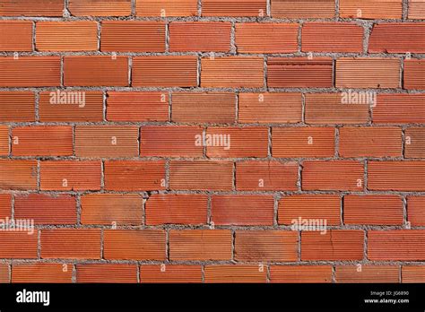 Unpainted brick wall. Background texture Stock Photo - Alamy