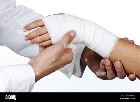 bandage an injured hand Stock Photo - Alamy