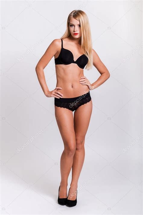 Woman in black bra and panties — Stock Photo © gstockstudio #79752694