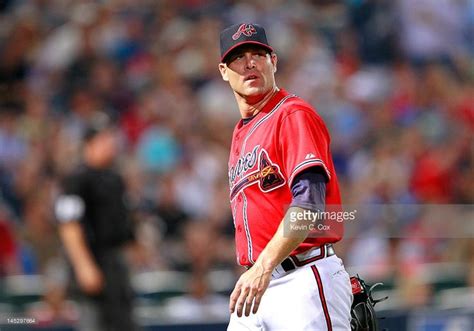 Tim Hudson of the Atlanta Braves pitches to the Washington Nationals ...