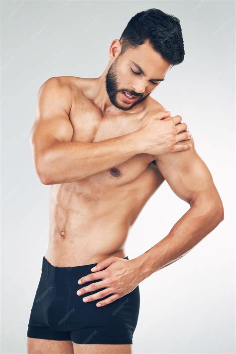 Premium Photo | Shoulder pain injury and fitness man in underwear in