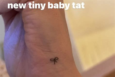 Hailey Bieber reveals new "tiny baby" tattoo