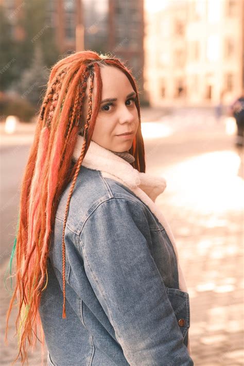 Premium Photo | Portrait of positive young woman with dreadlocks on