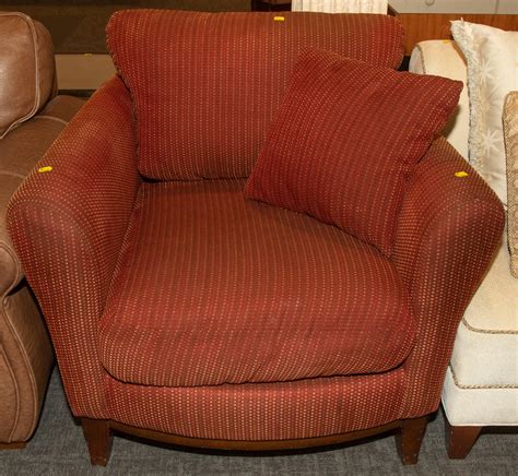 A Contemporary Cushioned Lounge Chair | Barnebys