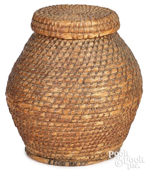 Very large Pennsylvania rye straw storage basket sold at auction on