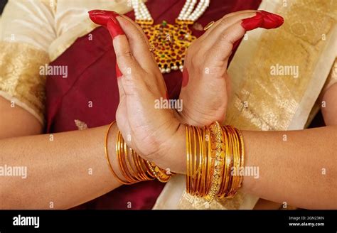 Woman hands showing "Nagabandha hasta" depicting how the snakes twine ...