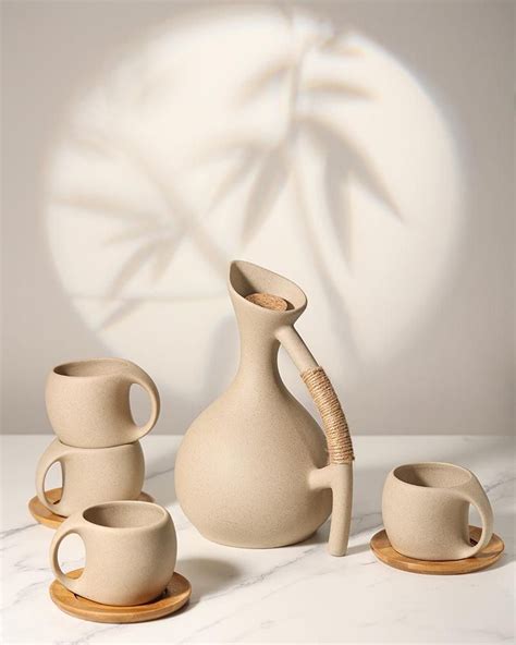 Natural clay pottery water jug with four cups – Artofit