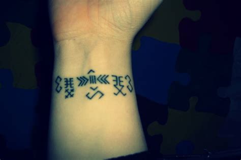 latviešu zīmes tetovējumi | Bamboo tattoo, Tattoos, Paw print tattoo
