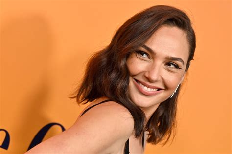 Gal Gadot Is All Smiles on Tropical Vacation Wearing Pink Rope Bikini
