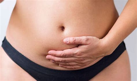 Stomach bloating: Bloated stomach pain is a warning sign of these four ...