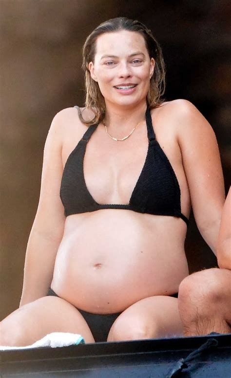 Margot Robbie in a Black Bikini Showing off Baby Bump on Vacation in