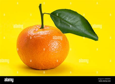 side view  sweet mandarin orange  leaf isolated  yellow