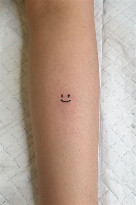 5 Adorable Smiley Face Small Tattoos to Brighten Up Your Day!