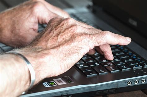 picture hand laptop computer computer keyboard technology
