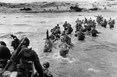 D-Day landings: Powerful photos of Allied troops storming Normandy beaches in June 1944