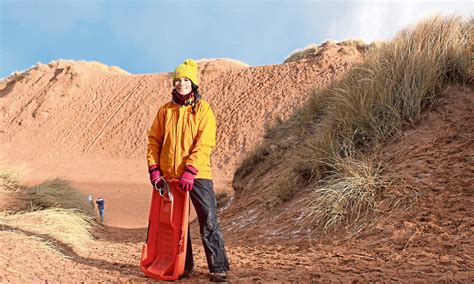 Sledging on sand dunes at Balmedie Beach - Press and Journal