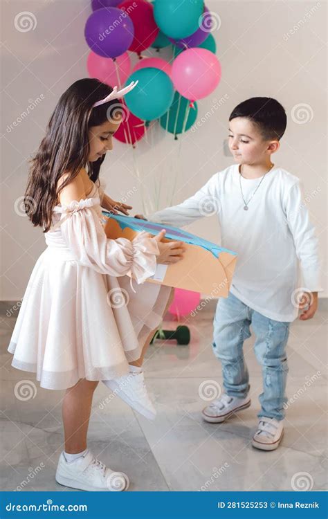 Sibling Love: a Special Birthday Moment at Home. Stock Image - Image of moments, party: 281525253