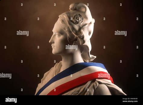 Statue of Marianne, national symbol of the French Republic draped in ...