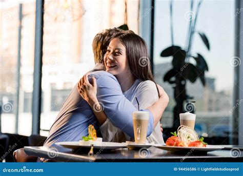Happy Young Couple in Love at Romantic Date in Restaurant Stock Photo ...