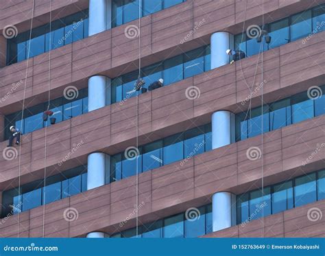 Workers Cleaning A Glass Facade Editorial Image | CartoonDealer.com ...