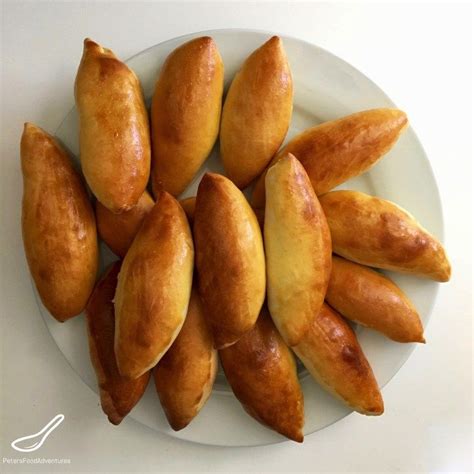 Piroshki is simply the plural form of the Russian word pirozhok ...