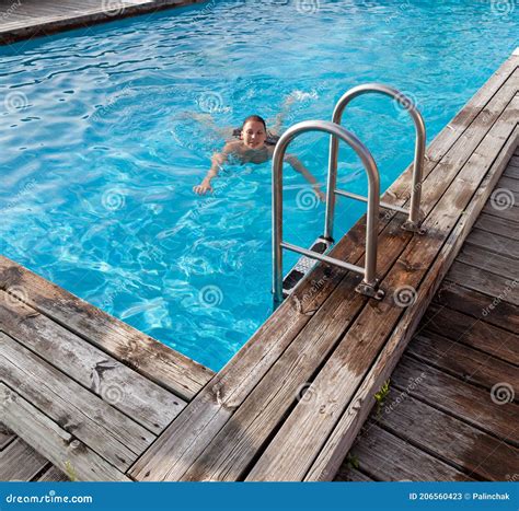 Young Nude Woman in the Outdoor Pool Stock Image - Image of beautiful