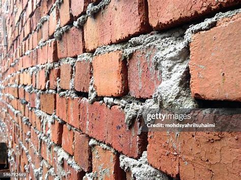 Building Brick Wall Photos and Premium High Res Pictures - Getty Images