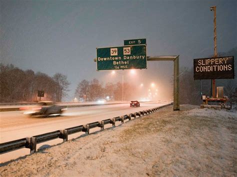 Photos: Winter storm arrives in New York City, bringing mix of rain and ...