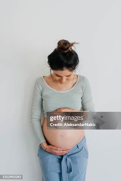 Pregnant Woman Front View Photos and Premium High Res Pictures - Getty ...