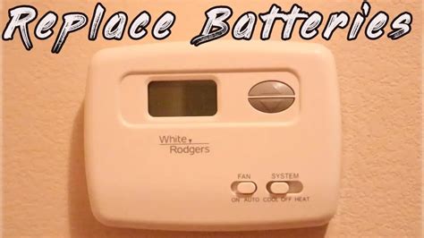 how to change battery in white rodgers thermostat