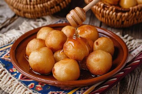 Premium Photo | A plate of baursak traditional Kazakh fried dough balls ...