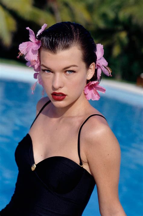 Download Milla Jovovich Stunning Summer Shoot Wallpaper | Wallpapers.com