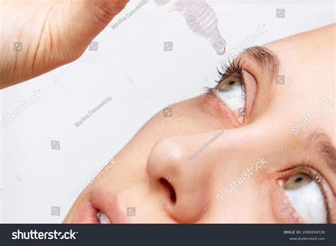 Close-up Woman Dripping Her Eye Medicinal Stock Photo 2090204728 ...