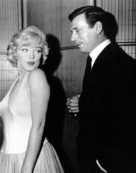 Photos of Marilyn Monroe and Yves Montand at a Press Party for “Let’s ...
