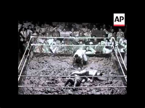 Wrestling in the Mud - YouTube