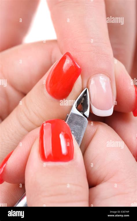 manicure applying - cutting the cuticle Stock Photo - Alamy